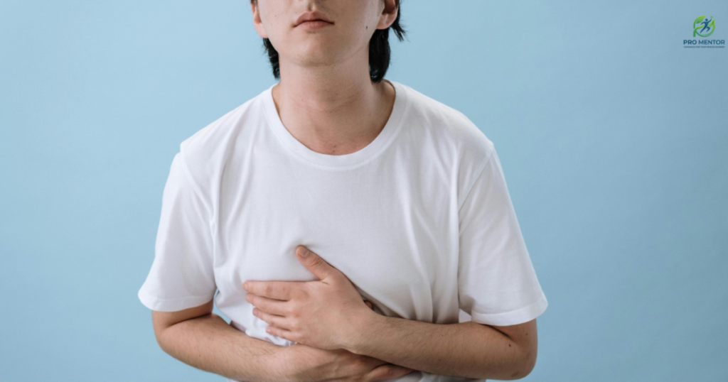 Young man experiencing stomach bloating and digestive discomfort